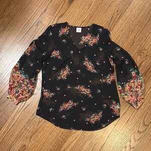 CAbi Black Top with Vibrant Floral Accents